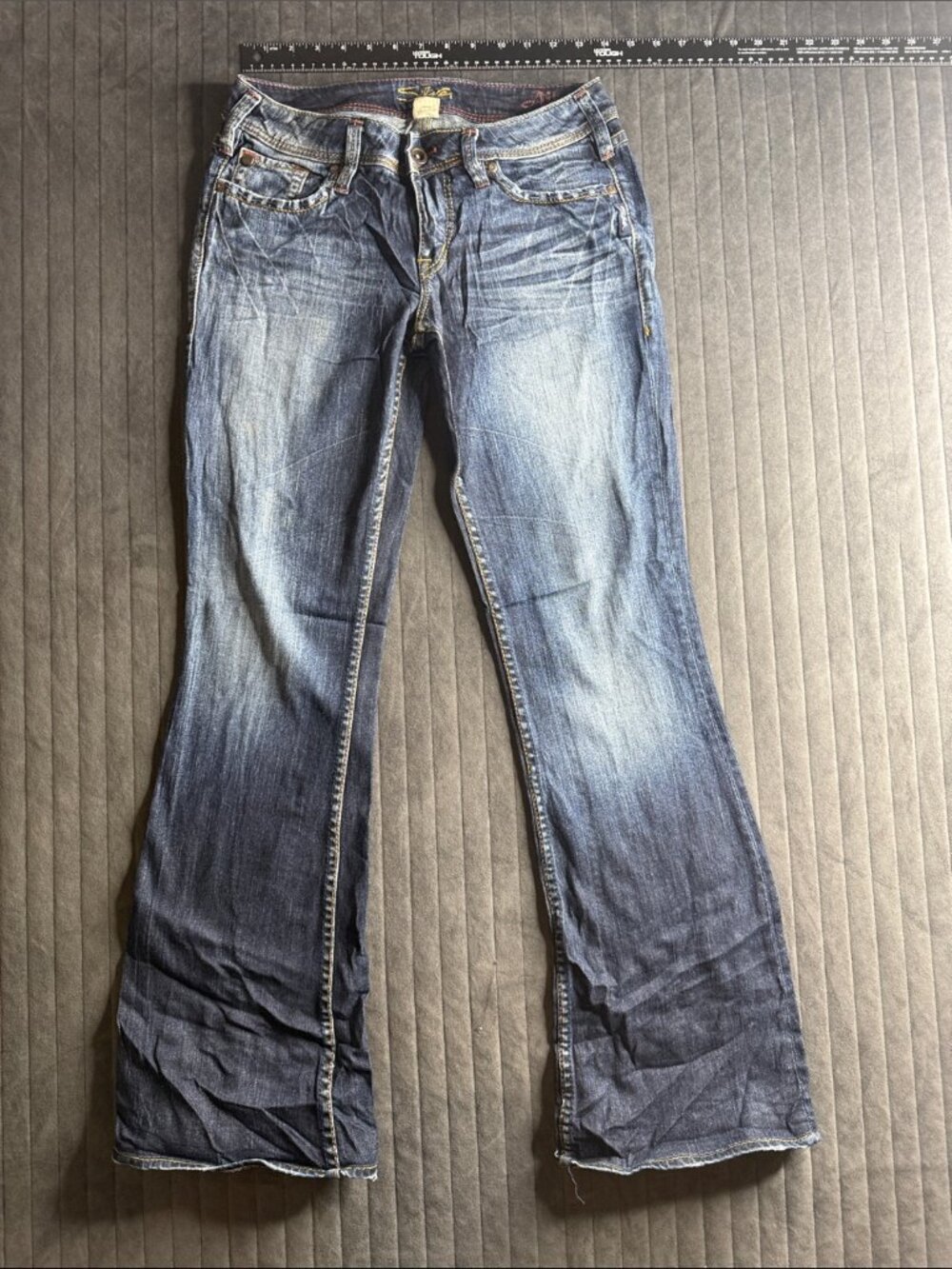 Silver Jeans medium wash blue flare jeans 96